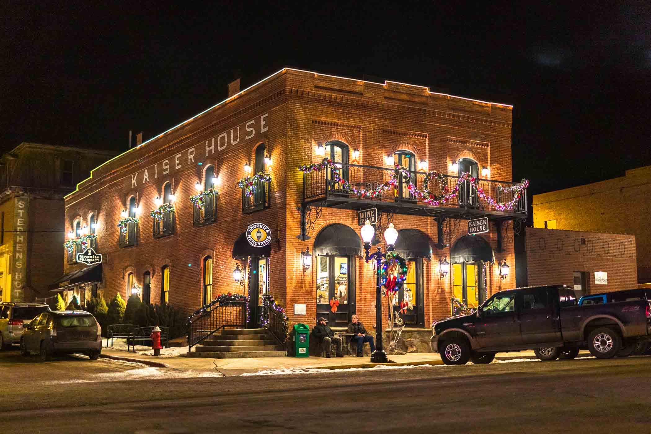 The Kaiser House decorated for the holidays in the snow in Philipsburg, Montana.
